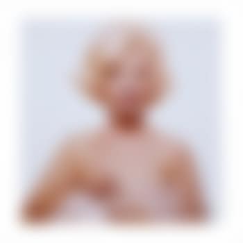Marilyn Monroe with bare shoulders holding jewels (preview)