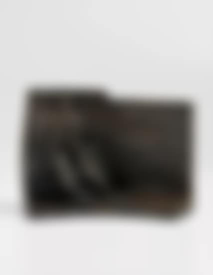 Draped Seated Figure against Curved Wall (preview)