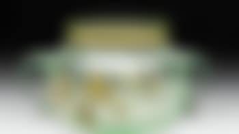 Vase de forme bombée en cristal légèrement teinté vert pâle à décor émaillé de nénuphars et fleurs des marais, deux anses appliquées , (preview)