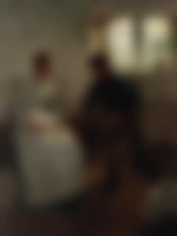 Interior scene with girl doing needle-work and boy watching (preview)