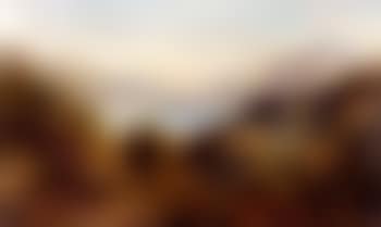 View of a mountain lake, with a village in the distance (preview)