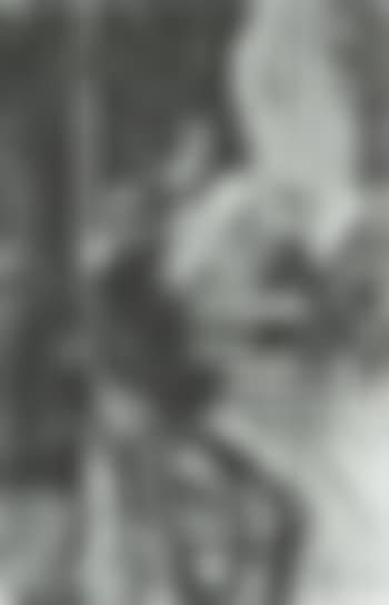 Gentleman reading the newspaper in a cafe (preview)