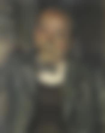 Portrait of a man in a bow tie smoking a pipe (preview)