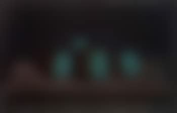Composition with four pieces of fruit on table (preview)