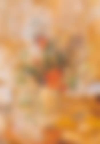 Vase of flowers on a table (preview)