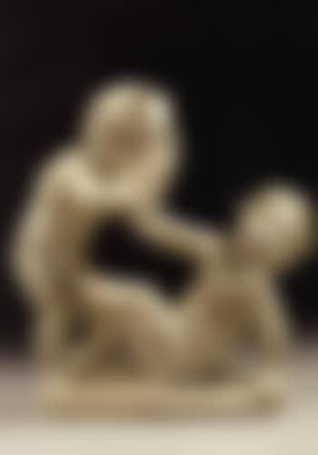 Two boys playing with a grotesque mask (preview)