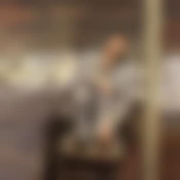 Red haired man on chair (preview)