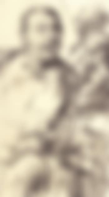 Seated man looking down to the right, bearded figure seen in profile (preview)