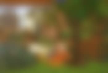 Seated figures in a garden with a large barrell (preview)