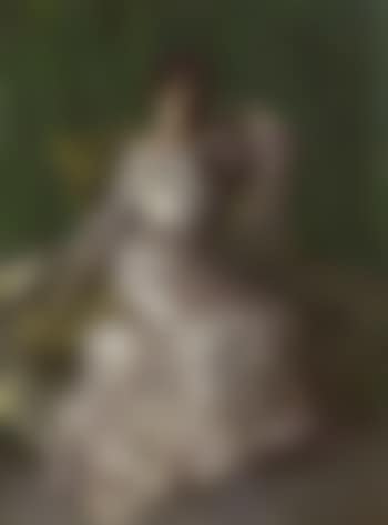 Portrait of Gisela von Wehner sitting on a sofa (preview)