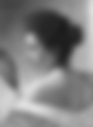 Young woman with hand mirror (preview)