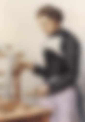 Young woman spinning thread (preview)