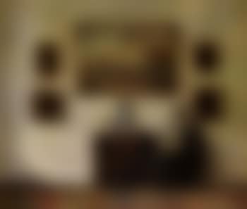 Interior scene with the artist's wife reading a book (preview)