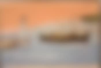Fishing boat moored at the quay with lighthouse (preview)