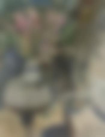 Bunch of flowers on a table in a garden (preview)