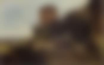 Fortress commander seated outside drinking coffee (preview)