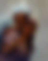 Arab man whispering to a smiling young girl (preview)