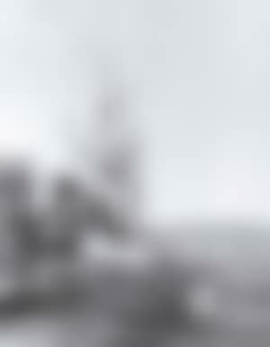 Vessel moored before a harbour town (preview)