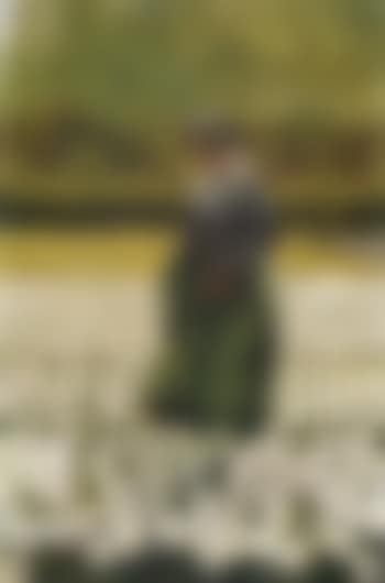 Dutch girl in field of tulips (preview)