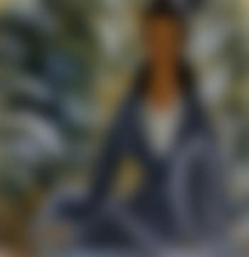 Lady sitting in front of the flower bed (preview)