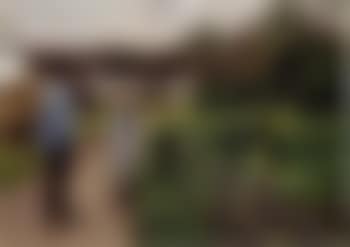Farmer and young girl talking on country road (preview)