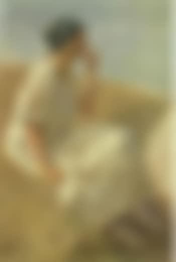 Girl seated wearing green head scarf (preview)