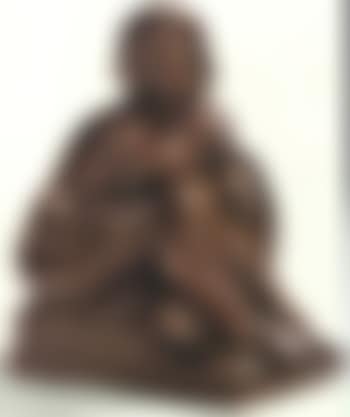 Young girl seated picking her feet (preview)