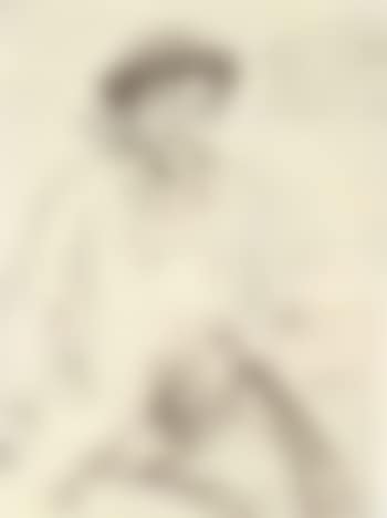 Seated man wearing hat (preview)