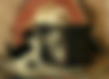 Three kittens playing by a stove (preview)