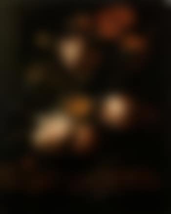 Still life of roses, irises and other flowers in a vase on a stone ledge (preview)