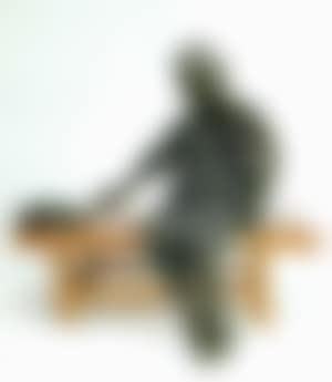 Figure of a mother feeding her child (preview)