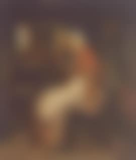 A cottage industry, old lady with spinning wheel in cottage interior (preview)