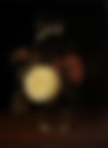 Rose in a glass on a table (preview)