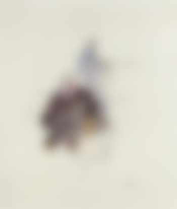 Man seated at table (preview)