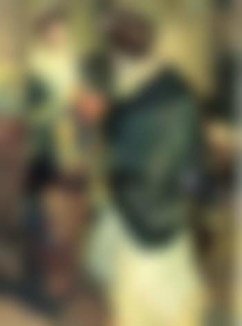 Woman looking in a mirror (preview)
