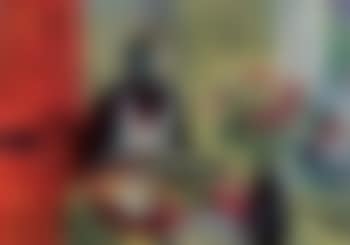 Woman with vegetables and flowers in interior (preview)
