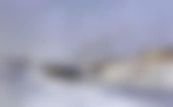 Sunny winter landscape with boats on frozen canal (preview)