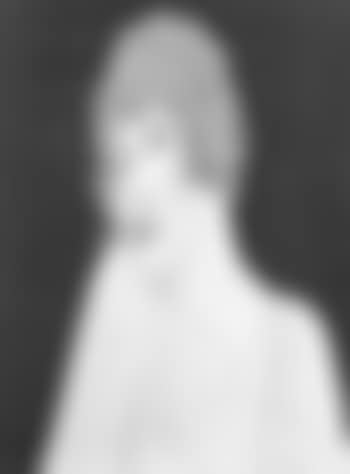 Head and shoulders of woman in yellow dress (preview)