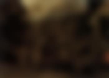 Hurdy-gurdy player surrounded by children on village street (preview)