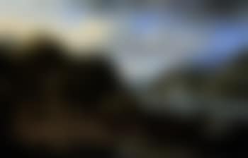 Mountain river landscape with market, hilltop castle beyond (preview)