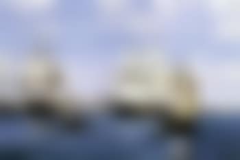 Merchant clipper at anchor in port (preview)