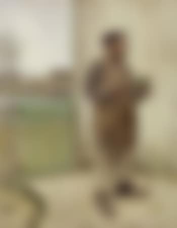 Man having just painted his fence (preview)
