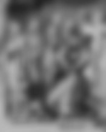 To the library. Woman standing with onlookers (preview)