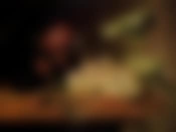 Still life with flowers and grapes on stone ledge (preview)