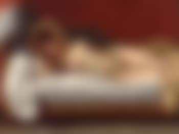 Model reclining on bed (preview)