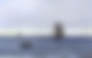 Seascape with vessels off snowcovered coast (preview)