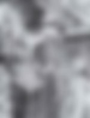 Three carnival figures on the canalside (preview)