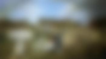 Grounds of a farmhouse with an architect showing his plans (preview)