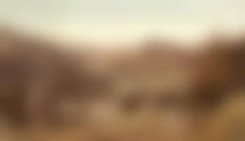 Haymakers resting beside a track with a village below (preview)