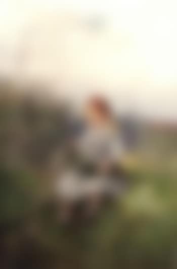 Girl with bouquet of flowers in summer meadow (preview)